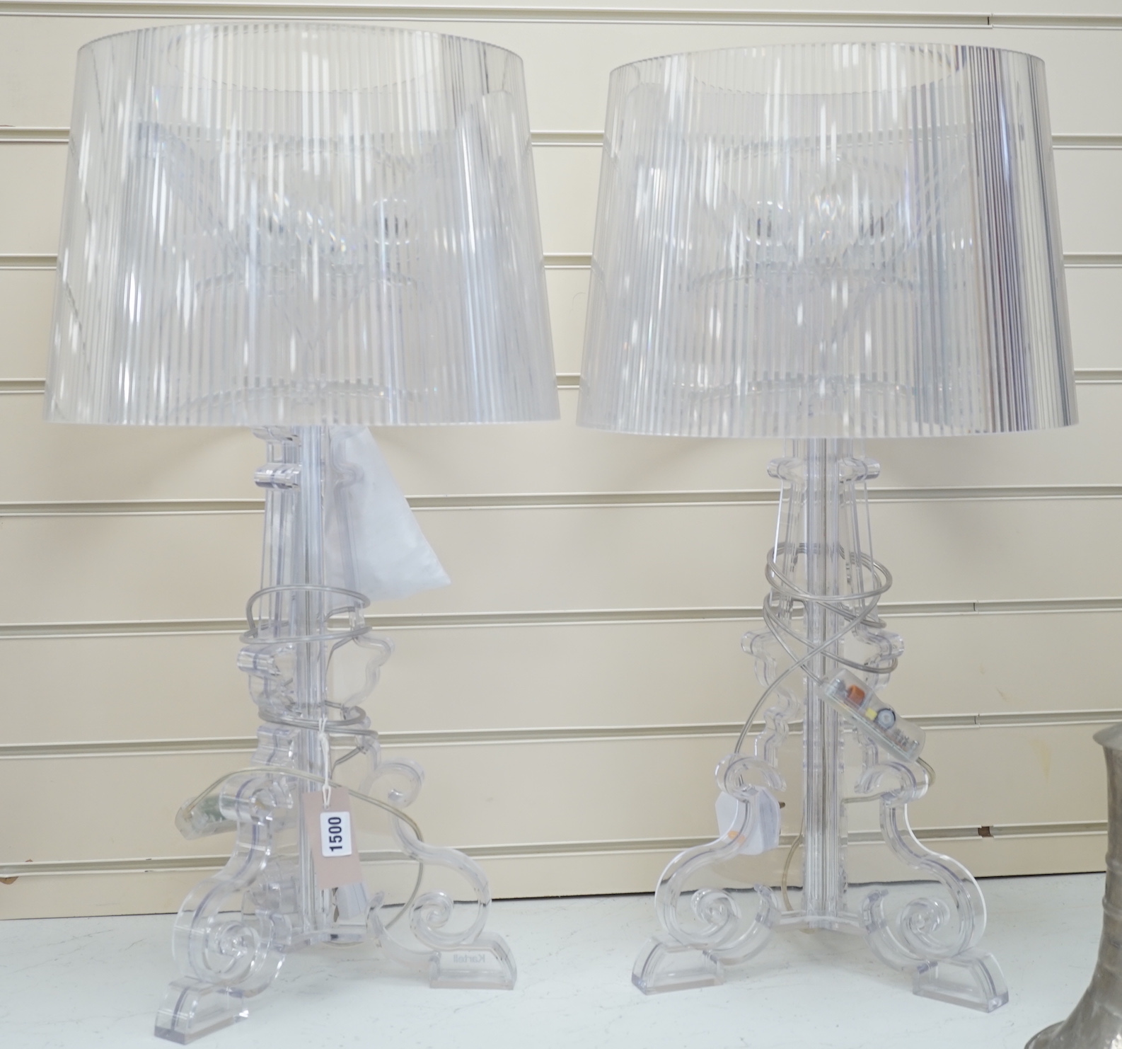 A pair of Bourgie table lamps by Kartell, clear polycarbonate, with original adjustable shades, 69cm high including shades